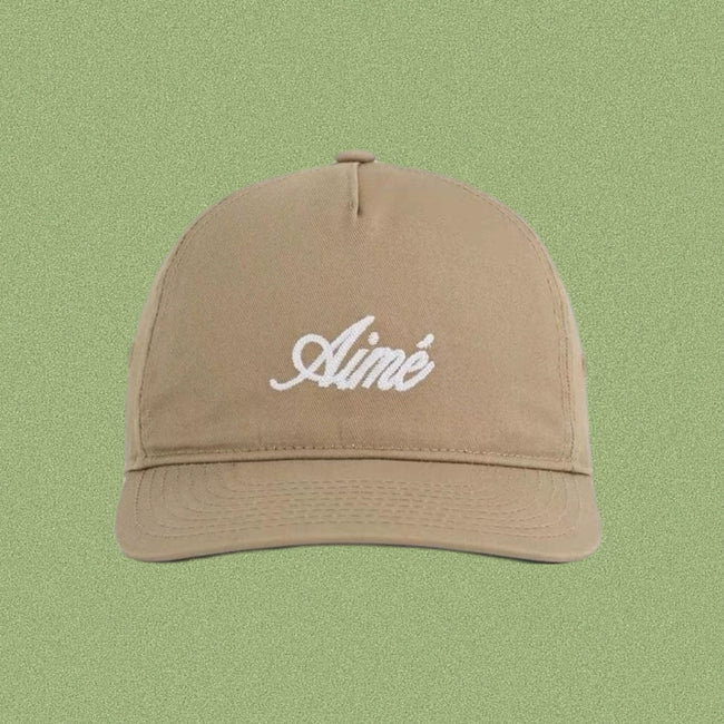 Aimé Leon Dore Cursive Script Hat - Tan Hover Image